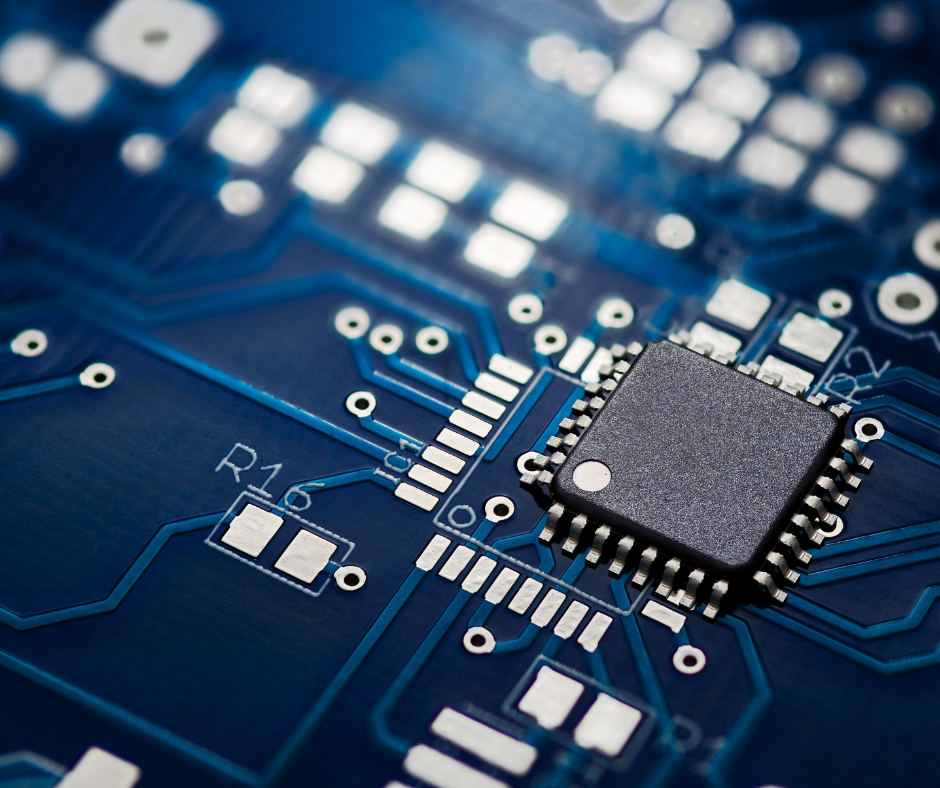 Close-up view of a microchip on a blue printed circuit board representing semiconductor technology